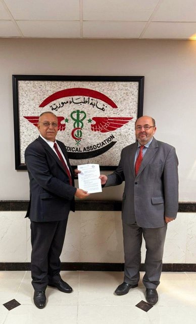 Dr. Ghassan Fandi, Head of the Syrian Medical Association and Charge d’affaires Mr. Roman Masarik