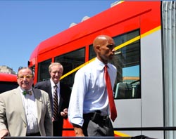 (Left to right) DC Councilman Graham, DC Councilman Evans, and Mayor Adrian Fenty board the Czech-made streetcar.