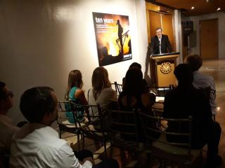 Ambassador Olsa giving his message