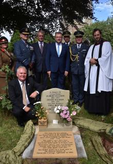 John Martin, representatives of the British Ground and Air Forces, Owen Paterson MP, Ambassador Ĺubomír Rehák, Col. Milan Gavlas, Col. Jiří Svatoš and the Reverend of Ightfield next to the Ellison family´s grave with the memorial stone 