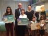 Consul General Sepalk with Mrs. Anna Merzlikina and awarded children