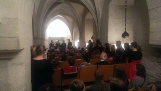 Saaremaa Gymnasium's male choir "Varsakabi" performing in the Kuressaare Castle 