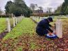 Tidying up the grave and the surrounding area