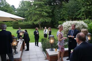 Director of the CzechTourism agency Katarina Hobbs with the guests at the garden of the Czech Ambassador´s residence