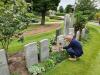 Tidying Bohumil Šíma’s grave at the Grandsable Cemetery near Falkirk 