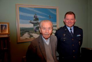 Col. Miroslav Liškutín with Czech Defence attaché Col. Jiří Svatoš Painting titled "It's a boy" capturing M. Liškutín in his spitfire at the moment when he was told that his son was just born Col. Miroslav Liškutín on a contemporary photography as a member of the Royal Air Force