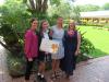 Noor with her teachers and repesentant of the Embassy