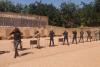 shooting the submaschine guns at military base in Ouagadougou