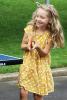 A young girl plays table tennis - photo by Mary Fetzko