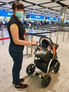 Kristián and his mother during the trasport through the airport to the hospital