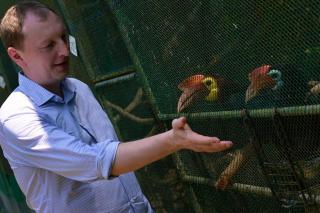 Hon. Robin Böhnisch with the endangered Talarak birds is the Talarak Rescuse and Conservation Breeding Center in Negros Occidental