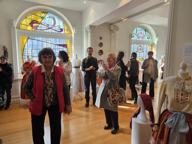 Visitors at the Czech, Moravian and Slovakian folk clothing exhibition.