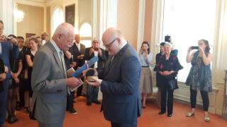 Minister of culture of the Czech Republic Mr Daniel Herman awards Mr Hans van Oostveen the medal Artis Bohemiae Amicis.