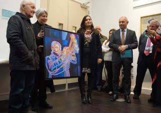 Alexander Sadlo devotes one of his paintings to the community center in Slough
