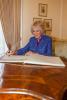 HRH The Duchess of Cornwall signs the guests book at the Residence of the Czech Ambassador