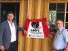 Mr Viktor Dolista and Mr Perry Garlick, coordinator of the project, at the signage