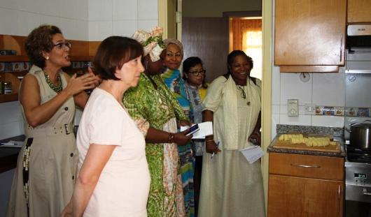 Women of ambassadors are attentively listening to Czech Recipes