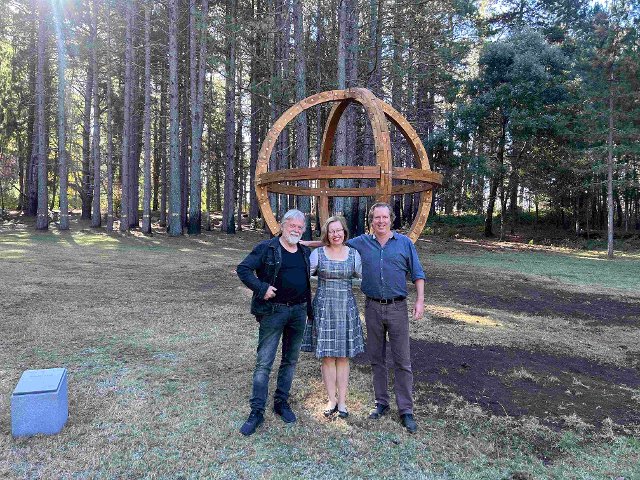 (from the left) Artist Václav Fiala standing infront of his newly unveiled sculpture  Universum  with the Consul-General of the Czech Republic in Sydney Zuzana Slováková and the founder and artistic director of Sculpture by the Sea David Handley.