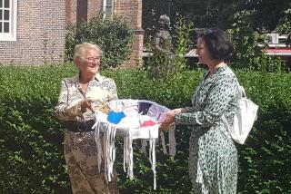 Ambassador K. Sequensová handed over the mouth masks from Hranice to the organisers of the Huygens festival.