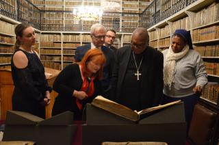 Cardinal Onaiyekan in the Nostic Library with the Minister of Culter H.E. Mr. Ilja Šmíd.