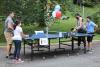 A family enjoys a game of table tennis - photo by Mary Fetzko